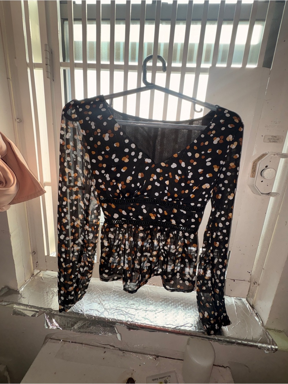 Francesca's Black Polka Dot Sheer V-Neck Peplum Blouse